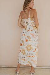 Woman wearing a floral dress with a beige background