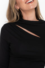 Carolyn long sleeve top in black, fitted top with asymmetric cutout neckline and ruched side detail, styled with denim jeans