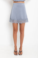 Ivy satin lace mini skirt in steel blue, tiered lace-trim mini skirt styled with a matching satin cami top