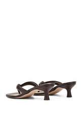 A pair of dark brown leather thong sandals with kitten heels, shown from a side profile view against a plain white background.