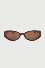 Sunglasses with brown lenses on a white background