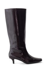 A single knee-high patent leather boot in a very dark brown or near-black color, shown from a side profile against a plain white background.
