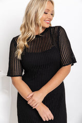 Airlie crochet dress in black, open-weave knit dress with short sleeves, styled with a black leather bucket bag and printed slide sandals