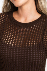 Airlie crochet midi dress in chocolate brown, open-weave knit midi dress with short sleeves, styled with a tan tote bag and thong sandals