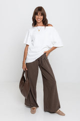 Landon wide leg check pants in chocolate brown, drawstring waist trousers with plaid pattern, styled with a white tee and mesh flats