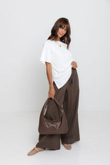 Landon wide leg check pants in chocolate brown, drawstring waist trousers with plaid pattern, styled with a white tee and mesh flats